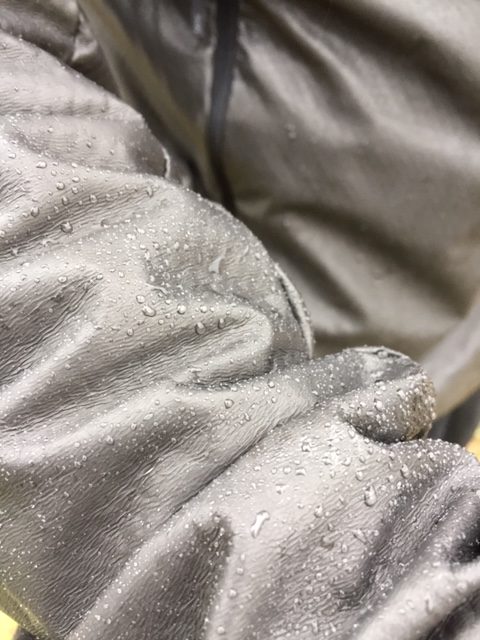 Showing Water Beading On The R5 Infinium Jacket